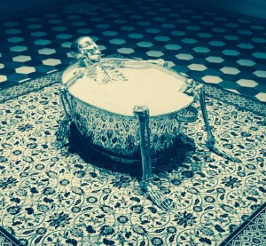 A skeleton in a bath tub.