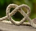 Heart created with knotted rope.