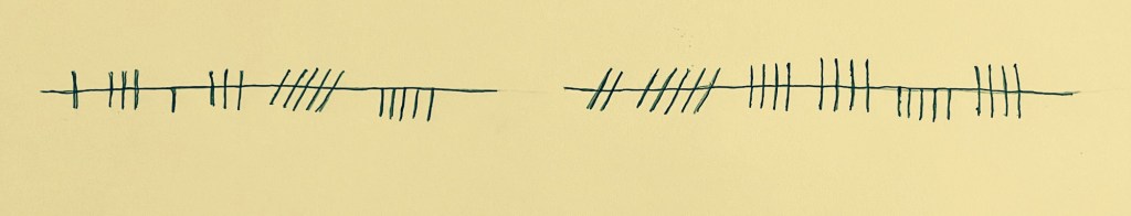 Two horizontal lines with diagonal and vertical hatch marks going through them. Some hatch marks merely meet the horizontal lines.