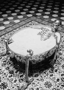 A skeleton in a bathtub.